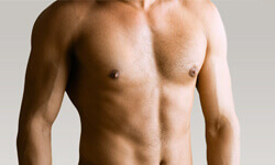 Picture of a male chest showing the results of a Gynecomastia procedure.