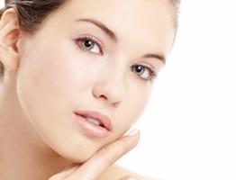 Close-up portrait picture of a beautiful woman’s face, showing the chin improvement procedure she had in Costa Rica.
