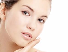 Close-up portrait picture of a beautiful woman’s face, showing the chin improvement procedure she had in Costa Rica.