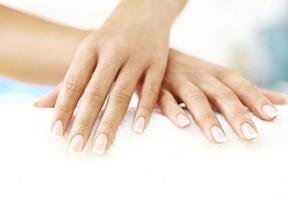 Close-up picture of a woman’s hands, showing the fat transfer to the back of her hands procedure she had in Costa Rica.