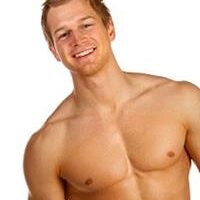 Picture of a man with his shirt off, showing the results of the Gynecomastia procedure he had in Costa Rica.