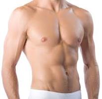 Picture of a man with his shirt off, showing the male breast reduction procedure he had in Costa Rica.