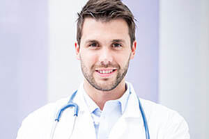 Portrait picture of a smiling Costa Rican doctor.