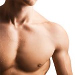 Picture of a male chest showing the results of a Gynecomastia procedure he had in Costa Rica.