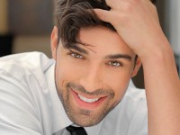 A close-up picture of a man in a white shirt showing his micro-hair transplant procedure he had in Costa Rica