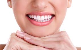 Picture of a woman showing the results of the dental bone graft procedure she had in Costa Rica.